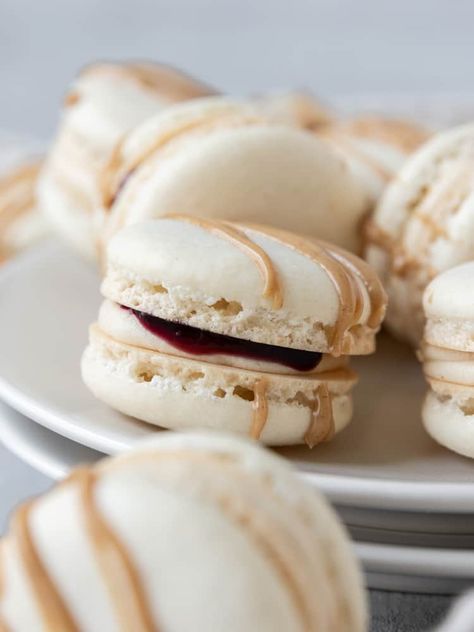 Peanut Butter and Jelly Macarons | Kitchen 335 Strawberry Macarons, American Buttercream, Banana Pudding Cheesecake, Cinnamon Sugar Donuts, French Macaron, Macaroon Recipes, Buttercream Recipe, Macaron Recipe, Peanut Butter And Jelly