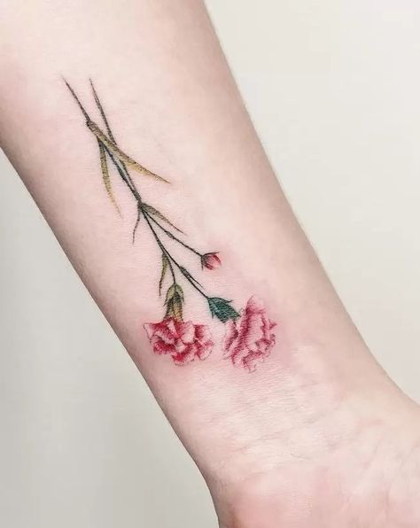 The Meanings Of Carnation Tattoos (Explained In Detail) Carnation And Marigold Tattoo, Line Lavender Tattoo, Pink Carnation Tattoo, Fine Line Lavender, Fine Line Lavender Tattoo, Carnations Tattoo, Carnation Tattoos, Carnation Flower Tattoo, Pansy Tattoo