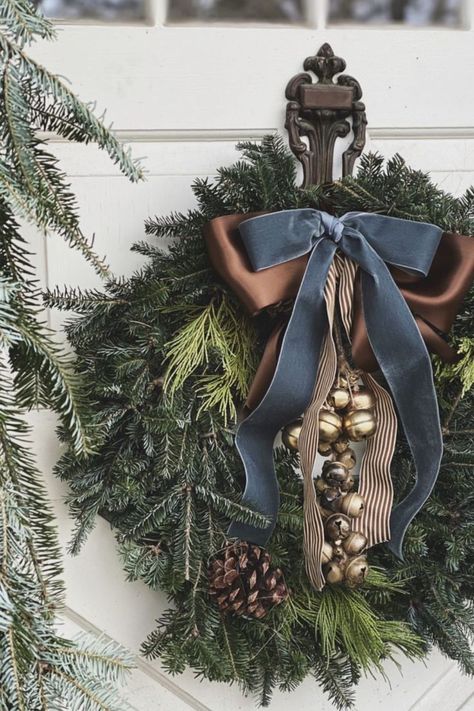 20 Unique 2023 Christmas Decor Trends You Need To Try This Year - Its Claudia G West Elm Christmas Decor, Christmas Inspo 2023, Navy And Brown Christmas Tree, Grandpa Chic Christmas, Large Outdoor Wreath On House, Moody Christmas Wreath, Green Black Brown Christmas Decor, Moody Holiday Decor, Pottery Barn Christmas Decor Inspiration