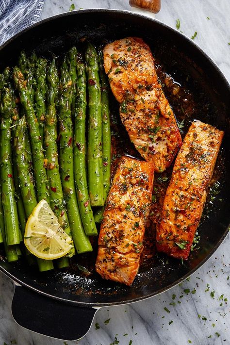 Garlic Butter Salmon with Lemon Asparagus Skillet – Healthy, tasty, simple and quick to cook, this salmon and asparagus recipe will have you enjoy a delicious and nutritious dinner. #salmon #salmondinner #salmonrecipes #deliciousfood #dinnerisserved #salmoneats #seafood #salmonandshrimp #shrimpdinner #sheetpandinner Dinner Salmon, Nutritious Dinner, Salmon With Lemon, Asparagus Recipes Baked, Garlic Butter Salmon, Lemon Asparagus, Butter Salmon, Salmon And Asparagus, Healthy Salmon