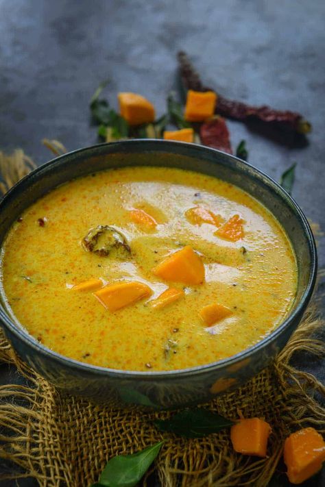 Fajeto, mango kadhi, or aam ki kadhi is a Gujarati dish made using yogurt, chickpea flour, and ripe mangoes. Pair this spicy, savory, tangy, and sweet dish with steamed rice for a hearty meal. Mango Recipe, Breakfast Desserts, Mango Dessert, Aloo Gobi, Curry Recipes Indian, Keto Friendly Desserts, Mango Puree, Mango Recipes, Chickpea Flour