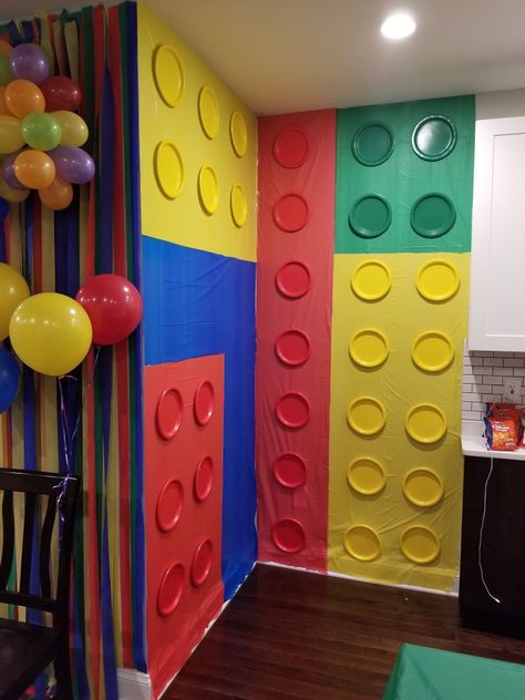 Lego Wall. Great for decorations and even a back drop for photos. Lego Birthday Party Centerpieces, Lego Baby Shower Ideas, Diy Lego Decorations, Lego Party Decorations Diy, Lego Backdrop, Lego Balloons, Lego Party Decorations, Classroom Decoration Ideas, Lego Camp