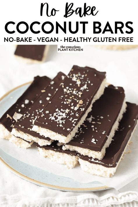 These no-bake coconut bars are the easy healthy version of your favorite bounty - or almond joy - candy bars with no refined sugar. A 5-ingredient no-bake vegan dessert with a melt-in-your-mouth coconut layer topped with crunchy dark chocolate. Almond Joy Bars, Coconut Milk Chocolate, Coconut Chocolate Bars, Almond Flour Cookies, Vegan Bar, Vegan Dark Chocolate, Clean Eating Recipes For Dinner, Coconut Bars, Slow Cooker Desserts