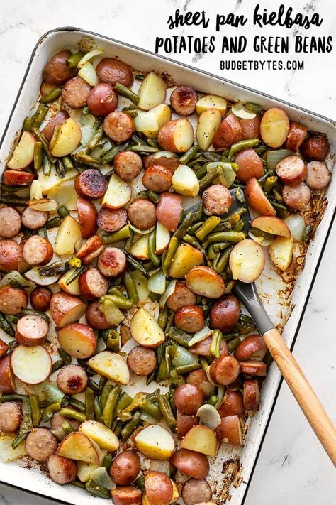 Sheet pan meals don't get an easier or more delicious than this Sheet Pan Kielbasa Potatoes and Green Beans dinner. Budgetbytes.com Sheet Pan Kielbasa, Kielbasa Potatoes, Kielbasa And Potatoes, Potatoes Green Beans, Potatoes And Green Beans, Sheet Pan Suppers, Sheet Pan Dinners Recipes, Budget Bytes, Green Beans And Potatoes