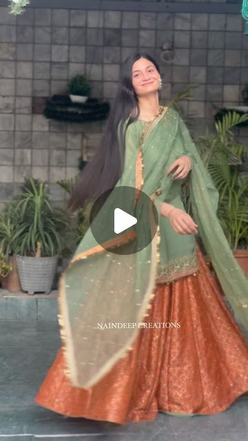 NAINDEEP KAUR on Instagram: "This outfit is made of a beautiful and everlasting sage green shirt which is paired with orange rust, pure brocade heavy flared sharara. It is decorated with intricate patterns that display a captivating design style and an elegant charm.  Outfit : @naindeepkaurcreations  . . #formals #semiformals #partydresses #partywear #weddingdress #pret #couture #bridal #bridalwear #punjabisuits #ethnicwear #vintagewesternwear #class #classicwear #royal designersuits #designerdresses #reels #trendingreels #reelsinstagram #reelsinstagram #reelsvideo #HauteCouture, #CoutureFashion, #DesignerWear, #LuxuryFashion #FashionElegance #CoutureMagic" Brocade Sharara Suit, Orange Sharara Suit, Indian Sharara Outfits, Sharara Designs Party Wear, Brocade Dress Styles, Brocade Sharara, Sharara Suit Design, Sage Green Shirt, Green Sharara Suit