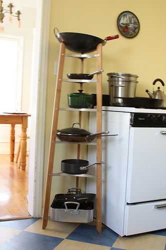 Gallery: Cookware Stands for Storing Pots and Pans | The Kitchn Storing Pots And Pans, Metal Cooking Utensils, Cookware Stand, Blue And White Kitchen, Magnetic Knife Rack, Vintage Milk Bottles, Tile Counters, Pan Storage, Le Creuset Cookware