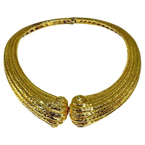 This massive and striking 18K yellow gold Italian choker necklace was manufactured during the Mid-20th Century, to the very highest standards of the gold crafting art. It is finished on all of it's frontal surfaces with a deeply chiseled, hammered finish. The entire reverse side is finished in a pierced gold gallery, which assures a comfortable fit. At the widest point in front, measuring 1 1/4 inches, this item creates an imposing presence when worn. It opens at the front and is hinged at the r Gold Gallery, Wedding Jewellery Necklace, Wedding Necklace, 20th Century, Wedding Jewelry, Necklace Etsy, Choker Necklace, Gold Bracelet, 18k Gold