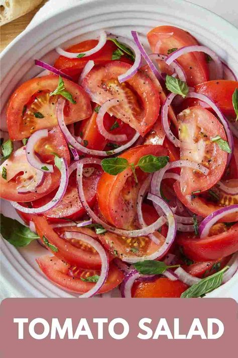 Fresh and flavorful, this Tomato Salad needs only a handful of simple ingredients. Juicy heirloom tomatoes paired with sliced red onions tossed in a red wine vinaigrette dressing make for a deliciously refreshing side dish that everyone will love. Less is more with this salad! Dinner Cravings, Stuffed Mushrooms Vegetarian, Light Side Dishes, Vegan Feta Cheese, Marinated Tomatoes, Tomato Salad Recipes, July Recipes, Bbq Ideas, Beefsteak Tomato