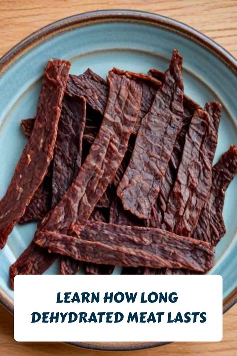 Dehydrated meat strips on a blue plate with text overlay: "Learn how long dehydrated meat lasts". Dehydrating Meat, Dehydrated Meat, Making Beef Jerky, Storage Tricks, Homemade Jerky, Bio Food, Deer Meat, Long Term Food Storage, Beef Strips