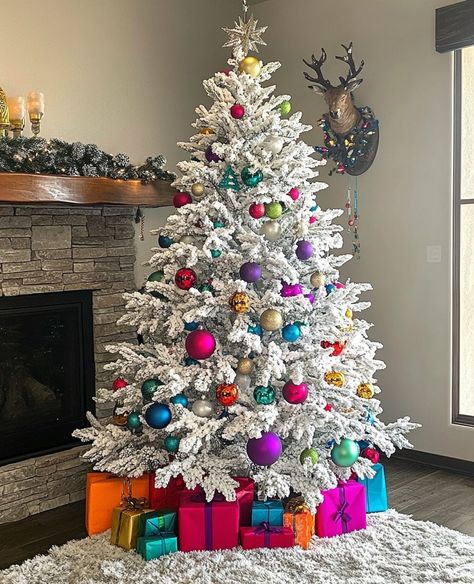 21 Stunning White Christmas Trees Decor Ideas White Tree Colorful Ornaments, White Tree With Colored Lights, White Colorful Christmas Tree, Colorful White Christmas Tree, Christmas Tree Without Topper, White Christmas Tree With Colored Lights, White Christmas Tree Colored Lights, Christmas Trees Decor Ideas, Christmas Tree Colored Lights