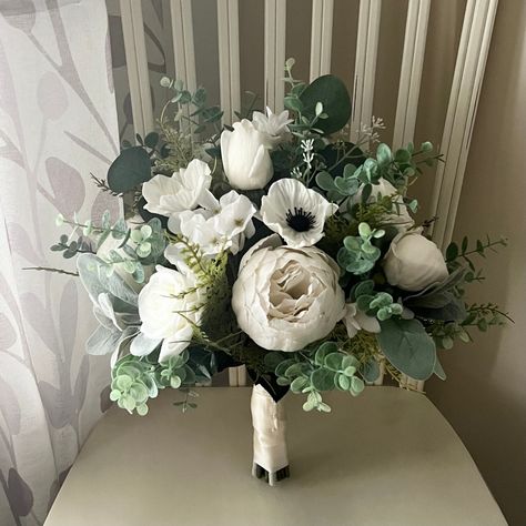 "Classic wedding bouquet, ivory roses & hydrangea with eucalyptus bridal flowers, boho silk flower wedding, ivory peony fern bridesmaid flowers  Each of my wedding bouquets are made with high quality, silk (artificial) flowers and elements.  As Shown; Bridal 13-14\" Shown Small bride 11-12\" Bridesmaid 9-10\" The bouquet pictured may have already sold; so, I will be creating a re-make for you. Each item is made to order, you can choose from different options at checkout. Making a purchase in my shop means you acknowledge and agree with my shop's policies. Please take a look at the policies before ordering. For standard orders, please check the shipping information within each listing, our shop policies, or our shop announcement for current production times. If you are in a rush, please con Peonies And Eucalyptus Bouquet, Wedding Bouquets Simple, Peonies Wedding Bouquet, Peony Wedding Flowers, Classic Bridal Bouquet, Classy Weddings, Peony Bridal Bouquet, Classic Wedding Bouquet, Eucalyptus Wedding Bouquet