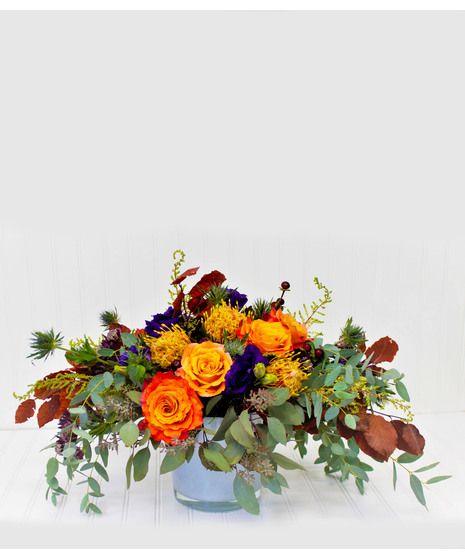 This vibrant arrangement brings all the warmth of an amber-touched fall afternoon. Filled with roses, protea, eucalyptus, and so much more, this heartfelt arrangement is the perfect gift for your loved ones. Fall Flower Centerpieces, Thanksgiving Flower Arrangements, Thanksgiving Floral Arrangements, Fall Afternoon, Thanksgiving Flowers, Thanksgiving Floral, Small Flower Arrangements, Corporate Flowers, Protea Flower