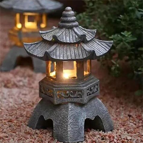 PRICES MAY VARY. 【Peaceful Zen Statue】Create tranquil harmony and zen to your home's garden spring decoration and place this solar pagoda light for landscaping in your outdoor arrays.This lantern pagoda statue will create a magic Zen oasis in your outdoor Oriental garden. 【Material】Pagoda garden statue is made of durable resin.Natural Stone Color is with rust, weather and UV resistant to keep your statue looking new over time.This Japanese-style solar garden lantern creates a warm and inviting g Japanese Garden Lanterns, Pagoda Garden, Japanese Garden Landscape, Pagoda Lanterns, Japanese Lantern, Japanese Zen Garden, Zen Garden Design, Stone Lantern, Tower Garden