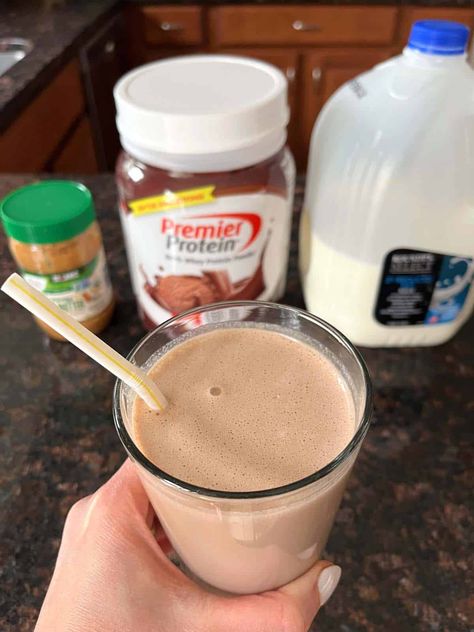 This Chocolate Peanut Butter Protein Shake is a delicious and easy way to fuel your day. Packed with rich chocolate flavor and creamy peanut butter, it's perfect as a breakfast, post-workout snack, or anytime treat. With simple ingredients and quick preparation, you'll have a satisfying and protein-packed shake in no time. Vanilla Peanut Butter Protein Shake, Premier Protein Chocolate Shake Recipes, Easy Chocolate Protein Shake, Chocolate Premier Protein Powder Shake Recipes, Smoothies With Chocolate Protein Powder, Oatmeal Shake Recipes, Chocolate Premier Protein Shake Recipes, Protein Powder Drink Recipes, Snickers Protein Shake