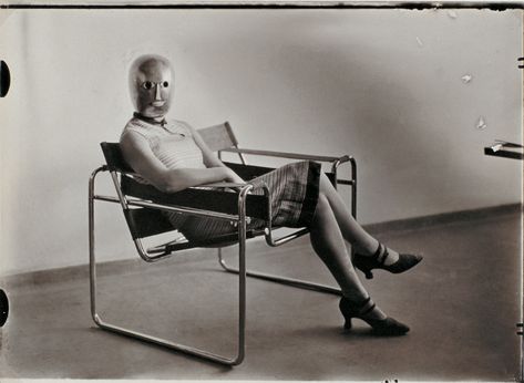 Erich Consemüller, "Untitled (Woman in B3 club chair by Marcel Breuer wearing a mask by Oskar Schlemmer and a dress in fabric designed by Lis Beyer)." c. 1926 Marcel Breuer Wassily Chair, Oskar Schlemmer, Herbert Bayer, Wassily Chair, Metal Workshop, Ludwig Mies Van Der Rohe, Bauhaus Art, Walter Gropius, Josef Albers