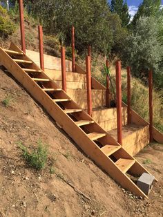 Steep hillside terraces with staircase, to be turned into a chicken coop. Sloped garden beds. DIY terraced beds. Hillside Terrace, Sloped Backyard Landscaping, Taman Diy, Landscaping A Slope, Sloped Yard, Hillside Garden, Sloped Backyard, Garden Stairs, Tiered Garden