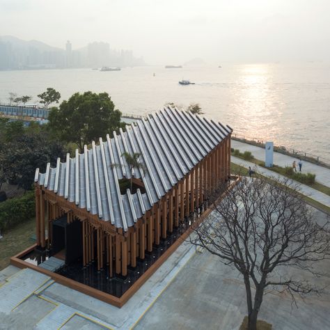 Timber pavilion unifies landscape and waterfront in West Kowloon district Pavilion Landscape, Timber Pavilion, Landscape Urban Design, Wooden Pavilion, Roof Cladding, Sloped Roof, Pavilion Plans, Park Pavilion, Glass Pavilion