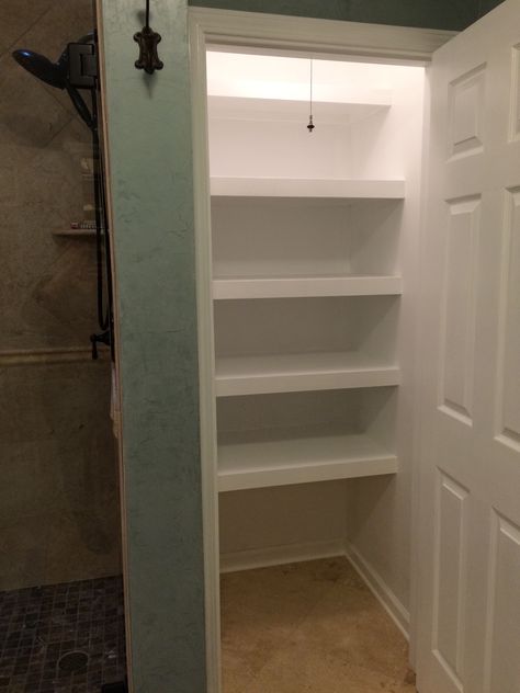 Finally got a custom built linen closet. Replaced the shower stall. Thanks Monty Tile & Home Convert Shower Stall To Linen Closet, Bathroom Closet Shelves Ideas, Closet In A Bathroom, Shower To Closet Conversion, Shower Into Closet, Converting Shower To Closet, Turn Shower Into Closet, Linen Closet Redo, Custom Linen Closet