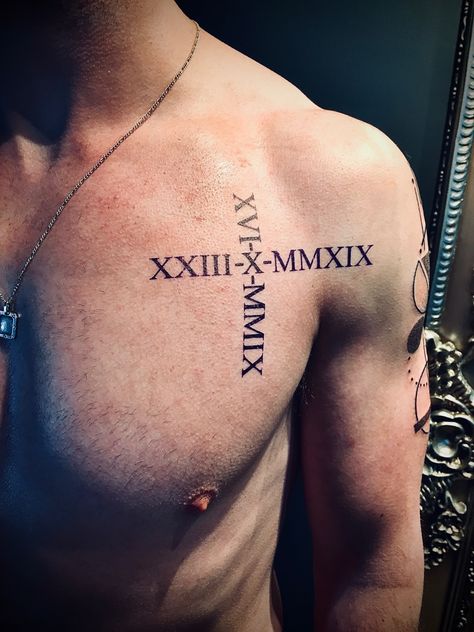 Mens chest tattoo numeral Date Tattoos Men, Roman Numeral Tattoo Men Chest, Chest Tattoo Roman Numerals, Chest Tattoo Family, Roman Numeral Birthday Tattoo, Roman Numeral Tattoo Men, Mens Chest Tattoo, Roman Numeral Tattoo With Name, Roman Numbers Tattoo