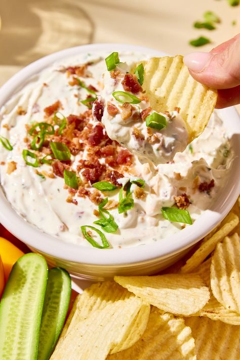 This High Protein Crack Dip recipe is perfect for the pool, parties, and snacking. It features a blend of Greek yogurt, ranch seasoning, cheddar cheese, crispy bacon, and green onions. A healthier twist on a classic favorite, it pairs perfectly with chips, crackers, or fresh veggies. This recipe is low carb and gluten-free and can also be tailored or be dairy-free. Easy Protein Pancakes, Yogurt Ranch, Greek Yogurt Ranch, Dairy Free Yogurt, Dairy Free Cheese, Dairy Free Options, Ranch Seasoning, High Protein Low Carb, Pool Parties