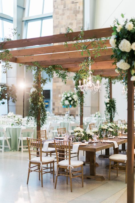 Greenery-Draped Pergola Reception Decor Pergola Wedding, Wedding Pergola, Purple Wedding Reception, Beach Wedding Aisles, Indoor Wedding Receptions, Pergola Lighting, Gold Wedding Decorations, Flower Installation, Pergola With Roof