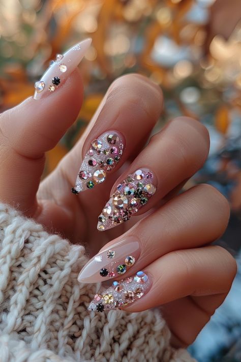 Sparkle and shine with 44 mesmerizing crystal nails designs! From delicate accents to full-on glamour, find the perfect look to make your nails dazzle and captivate Single Rhinestone Nails, Burlesque Nails, Short Nails With Rhinestones, Nail Rhinestone Design, Rhinestone Nails Designs, Classy Nail Art Ideas, Bday Nails, Vegas Nails, Sassy Nails