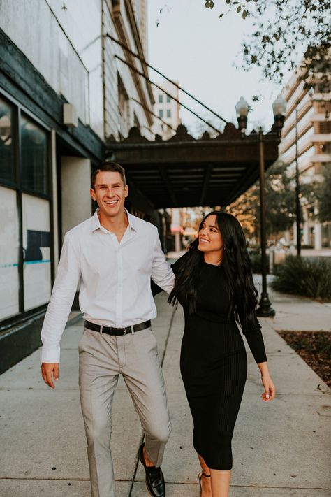 A couple walks hand in hand in the middle of Downtown Tampa. This is an engagement photo session with a very minimalist aesthetic Engagement Vibes, Tampa Downtown, Downtown Photoshoot, City Photoshoot, Couples Shoot, Photos Inspo, Couples Photo, City Engagement, Engagement Pics