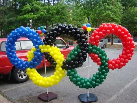 Olympic Rings by www.atlantaevents.biz Olympics Balloon Arch, Olympic Float Ideas, Diy Olympic Podium, Olympics Trunk Or Treat, Olympic Theme Decorations, Olympic Photo Backdrop, Olympic Balloon Arch, Olympic Decorations Diy, Olympic School Theme