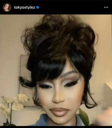 Cardi B Bun Hairstyle, 60a Hairstyles, Mc Bling Hairstyles, Cardi B Wigs, Cardi B Updo Hairstyle, Bangs With Bun Hairstyle, Up Do Hairstyles With Bangs, Tommie Lee Hairstyles, Baddie Hairstyles Bangs