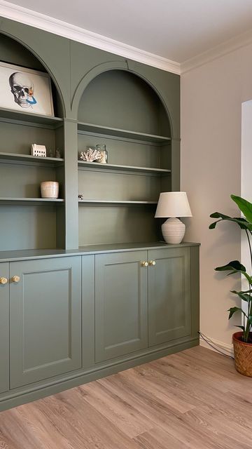 Built In Shelves Living Room Color Ideas, Green Paneling Walls, Sage Green And White Interior Design, Cabinet And Shelves Living Room, Sage Built In Bookcase, Living Room Green Wallpaper, Build In Cupboards Living Room, White Built In Bookshelves Living Room, Olive Green Built In Bookshelves