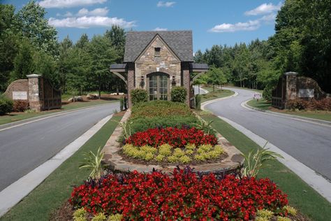 Landscaping is crucial to a grand entrance- Managed by Neighborhood Management Associates. Landscaping Entrance, Subdivision Entrance, Entrance Landscaping, Entrance Signage, Summer Planter, Front Yard Decor, Modern School, School Entrance, Rock Landscaping Ideas