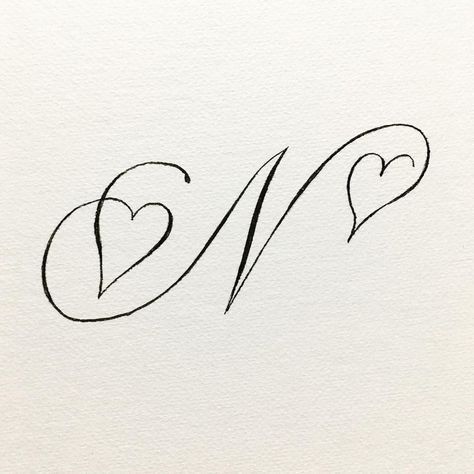 A love-ly capital N. Tag a lovely friend Written with a Tombow brush pen. save, share, comment… | Instagram Tombow Brush Pen, Pretty Handwriting, Tattoo Lettering Fonts, Cursive Letters, Lettering Styles, Letter N, Calligraphy Letters, Lettering Tutorial, Dope Tattoos