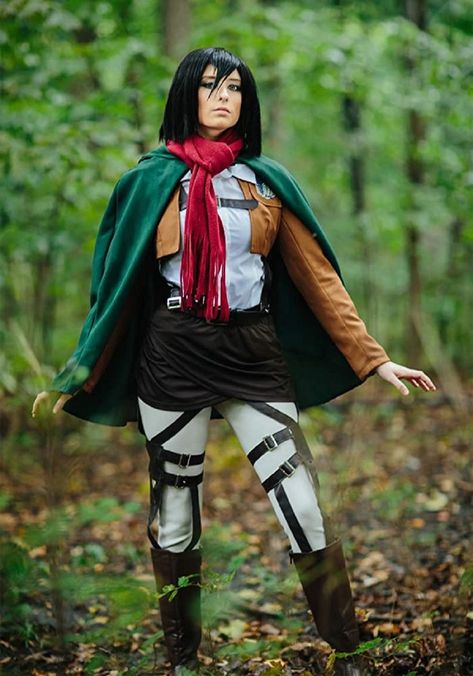 This anime costume is a deluxe replica of Mikasa's outfit from the popular series. It features a tan twill jacket with embroidered patches on the back, sleeves, and left breast pocket. It also comes with a green cape with a logo patch and faux leather harness pieces so you can have a realistic Attack on Titan outfit. #halloween #costume #mikasa #cosplay Mikasa Costume, Attack On Titan Outfit, Attack On Titan Costume, Mikasa Ackerman Cosplay, Catwoman Mask, Mikasa Cosplay, Attack On Titan Mikasa, Buyable Pins, Womens Cosplay