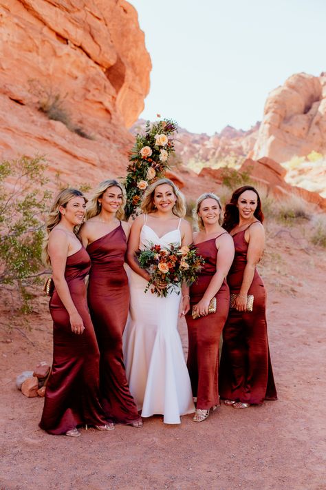 Bridal party bridesmaids in rust color dress at desert ceremony - desert wedding in Las Vegas Nevada Valley of Fire Desert Ceremony, Wedding In Las Vegas, Rust Color Dress, Sedona Wedding, Best Of Friends, Red Bridesmaids, Shades Of Burgundy, Valley Of Fire, Desert Wedding