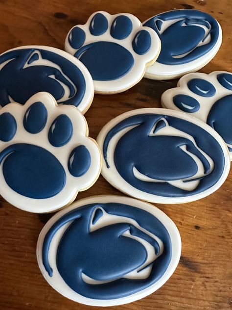 College logo cookies Penn State Cookies, Penn State Cupcakes, University Of Michigan Cookies Decorated, Utsa Graduation Cookies, College Signing Day Cookies, College Logo, Sugar Cookie Designs, Cookie Designs, Graduation Party