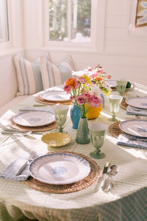 Setting A Spring Table - Julia Berolzheimer Grandmillenial Dining, Dining Table Place Setting, Dining Table Place Settings, Colored Plates, Southern House, Table Place Settings, Julia Berolzheimer, Colored Glassware, Woven Placemats