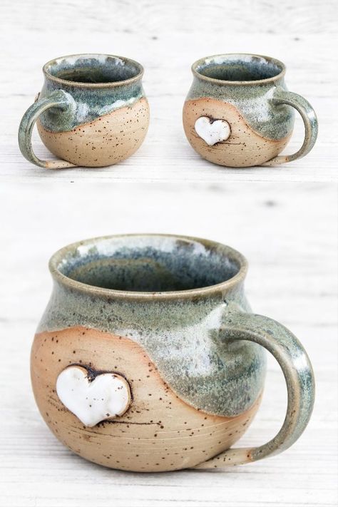 Hand thrown stoneware cup with white heart on side. Made on the pottery wheel of light beige smooth speckled clay and glezed with greenish semi glossy glaze with blue and turquoise vibes. Natural organic boho design farmhouse rustic drinking vessel for tea or coffee lovers. Unique Christmas Thanksgiving birthday gift with love Heart Pottery, Ceramics Pottery Mugs, Valentines Mugs, Boho Design, Pottery Cups, Ceramics Ideas Pottery, Ceramic Tableware, Pottery Wheel, Boho Designs