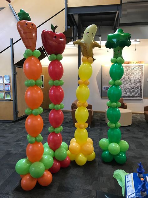 Don't forget your fruit and veggies #ballooncolumns #balloonpeopleaz #balloonwall #balloondecor Vegetable Balloon Garland, Fruit Balloon Garland, Fruit Backdrop, Planning 1st Birthday Party, Orange Display, Fruit Spirit, Fruit Balloons, Dancing Fruit, Pineapple Pictures