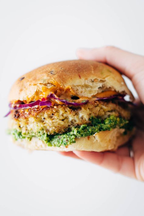 Spicy Cauliflower Burgers with avocado sauce, cilantro lime slaw, and chipotle mayo! Burgers With Avocado, Cauliflower Burger, Lime Slaw, Cilantro Lime Slaw, Spicy Cauliflower, Chipotle Mayo, Avocado Sauce, Vegan Burgers, Think Food