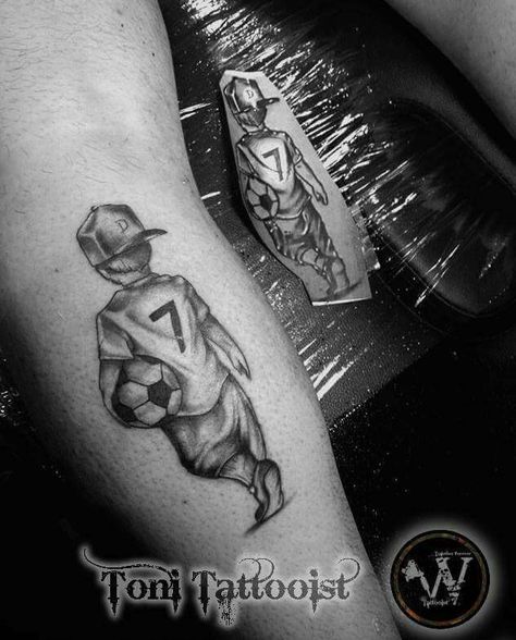 Black and gray , boy walking away tattoo Football Tattoo Ideas, Tattoo Football, Lion Shoulder Tattoo, Soccer Tattoos, Memorial Tattoo Ideas, Leg Sleeve Tattoos, Small Neck Tattoos, Football Tattoo, Sport Tattoos