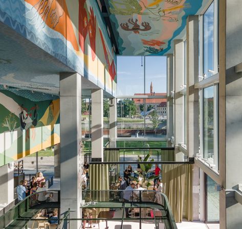 Gallery of Living in Community: 13 Projects That Promote Shared Spaces - 12 Poland Cities, Ceiling Murals, Mix Use Building, Exposed Brick Walls, Adaptive Reuse, Listed Building, Glass Facades, Salou, Mixed Use