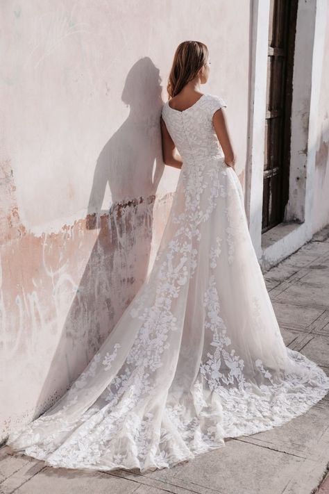 With a full skirt and cap sleeves, this lace gown is completely timeless | wedding inspo, classic wedding aesthetic, classic modern wedding, modern wedding, classic modern wedding dress, designer wedding dresses, romantic wedding gown, A-line wedding dress, timeless wedding dress, glam wedding dress, lace wedding dress, tulle wedding dress, dark romantic wedding, romantic wedding, christmas wedding, winter wedding, simple wedding dress, wedding dress back, lace wedding gown, a-line wedding dress Vintage Lace Wedding Dress, Wedding Dress Backs, School Dance Dresses, Timeless Wedding Dress, Lace Wedding Gown, Allure Bridals, Wedding Dress Lace, Modest Wedding, Wedding Dress Sizes