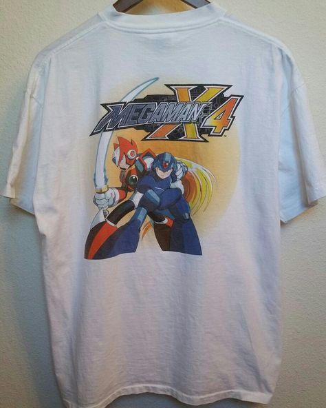 Vintage Mega Man X4 Capcom Promotional T-shirt, 90s Retro Rare Video Game Shirt, Adult Unisex Size XL, Hard to Find & Collectible. 1 on Etsy. Character Redesign, Video Game Shirt, Graphic Tee Vintage, Vintage Video, Vintage Video Games, Video Game T Shirts, Character Graphic, Rare Videos, Vintage Card