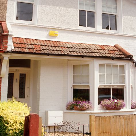 Exterior | Stylish white terrace | House tour | Ideal Home | PHOTO GALLERY 1930 House Exterior, 1930s House Exterior Uk, Terraced House Front Garden, Victorian Front Porch, White Terrace, 1930s House Exterior, Terrace House Exterior, Front Doors Uk, Ideal Home Magazine