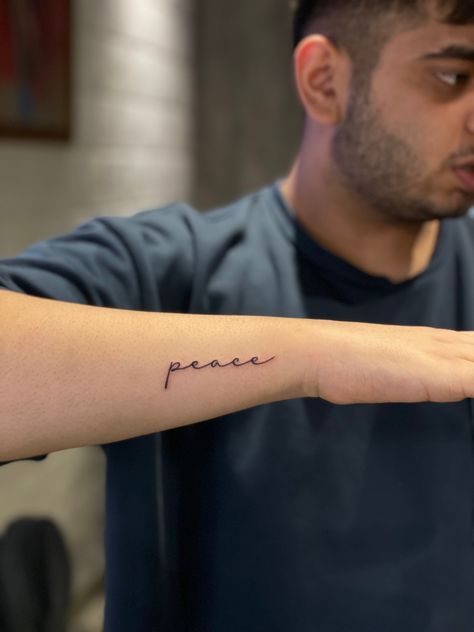 Peace Cursive Tattoo, Word Peace Tattoo, Peace Over Everything Tattoo, Choose Peace Tattoo, Tattoo Ideas Peace, Peace Word Tattoo, Peace Be Still Tattoo, Peace Tattoos For Women, Peace And Love Tattoo