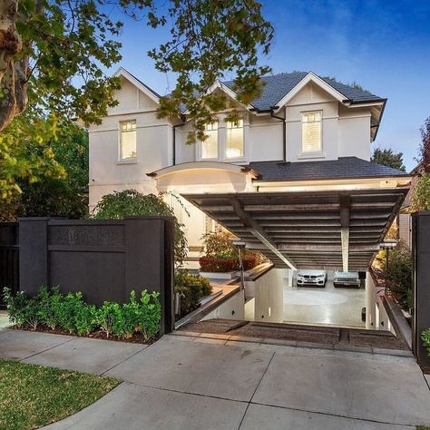 If adding a garage to the front of the house is creating an unappealing façade, why not hide it under the driveway? Our favourite project… Fireplace Pictures, Underground Garage, Melbourne Suburbs, Underground Parking, Street House, Beautiful Pools, Mansions Luxury, Man Caves, Garage Design