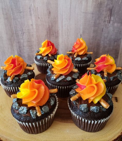 Chocolate cupcakes, camping theme birthday #campfire Cupcake Camping Theme, Fire Pit Cupcakes, Campfire Birthday Cake Ideas, Camp Cupcakes Ideas, Camping Theme Cupcake Ideas, 1st Birthday Camping Cake, Campfire Cupcakes Camping Birthday, Camp Kikiwaka Birthday Party, Camping Birthday Cupcakes