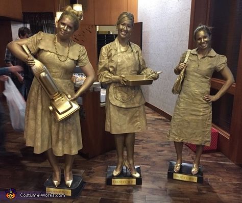 Valerie: My two friends and I dressed up as trophy wives for our work party, and it was such a hit! We spray painted the dresses gold and used Graftobian Metal... Trophy Halloween Costume Diy, Gold Trophy Costume, Trophy Costume Halloween, Gold Costume Ideas, Trophy Wife Costume, Tennis Halloween Costume, Diy Costume Contest Trophy, Trophy Costume, Diy Halloween Costume Contest Trophies