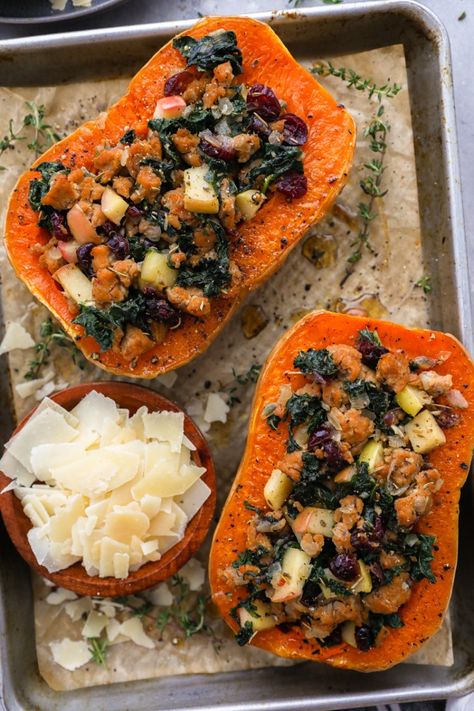 Sausage Apple & Cranberry Stuffed Butternut Squash - Kalefornia Kravings Squash Thanksgiving Recipes, Butternut Squash Thanksgiving, Squash Thanksgiving, Pomegranate Kale Salad, Kalefornia Kravings, Squash Butternut, Stuffed Butternut Squash, Fall Dinner Ideas, Stuffed Butternut