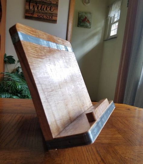 Awhile back I saw a really cool reclaimed wood cookbook/tablet stand advertised in a catalog. But the $110 price tag was a big "no, thanks" for me. Here is a tutorial on my version with plenty of options for you to customize a couple of your own.All of the materials used were on hand, so there was no cost involved other than an afternoon of our time. In the complete blog, I offer tons of suggestions for alternate materials, trim and finishes. Check it out! Cookbook Stand Diy, Diy Tablet Stand, Diy Recipe Book, Recipe Book Stand, Water Based Wood Stain, Recipe Book Diy, Salvaged Furniture, General Finishes Milk Paint, Cookbook Holder